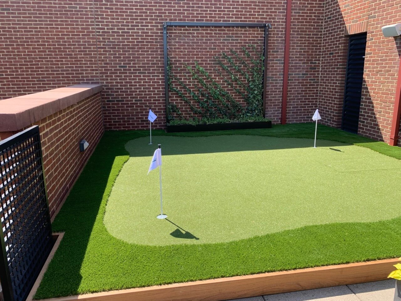 Putting green made with artificial turf