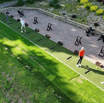 Golfers teeing off on artificial grass from SYNLawn