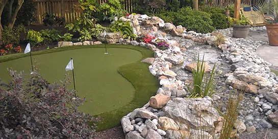 Backyard golf green installed by SYNLawn